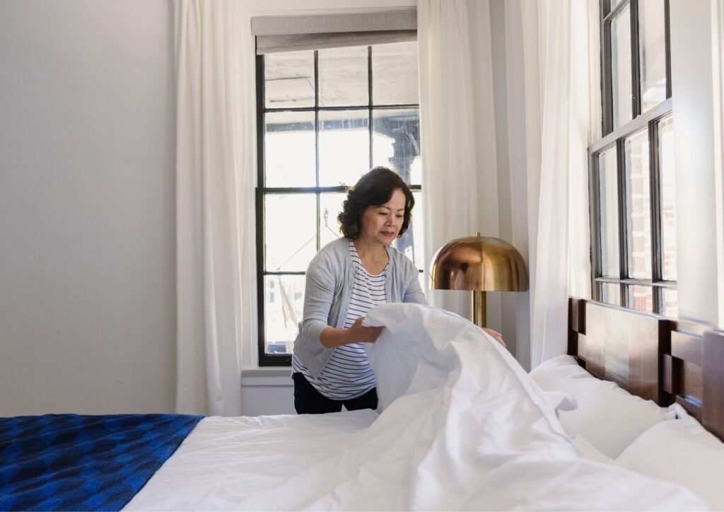 Making your bed is the first thing you should do when you wake up to maintain a clean and organised home.