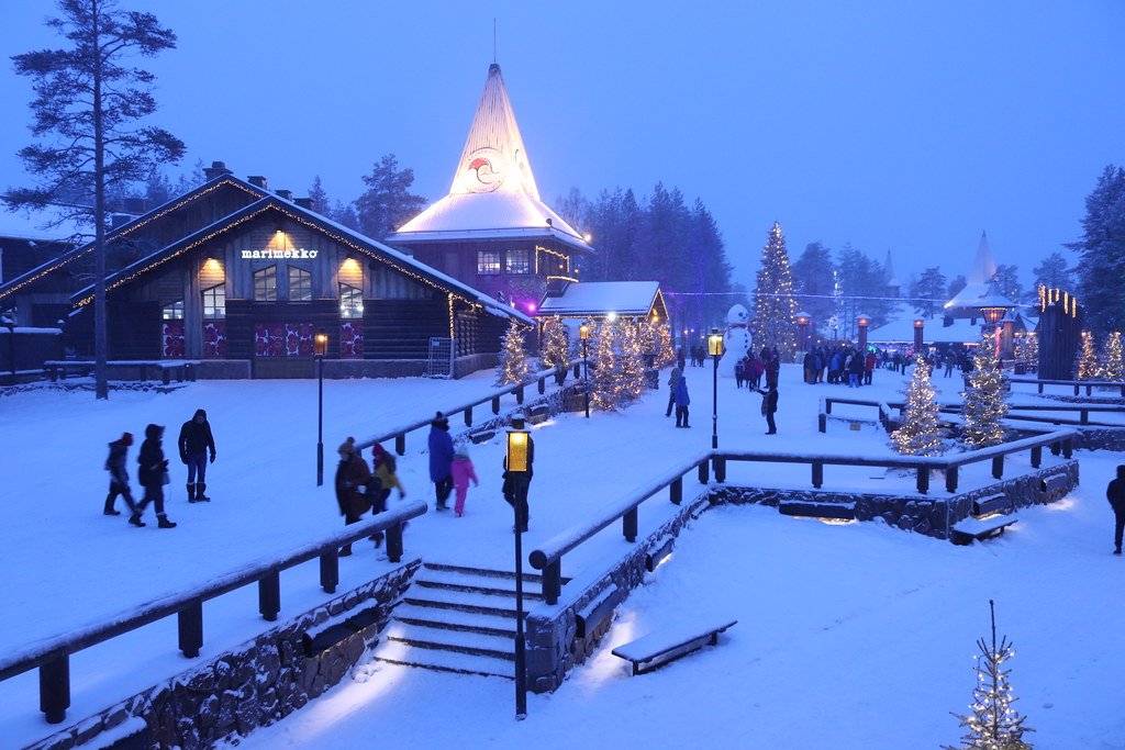 An image of tourists visiting the Santa Claus Village in Finland.
