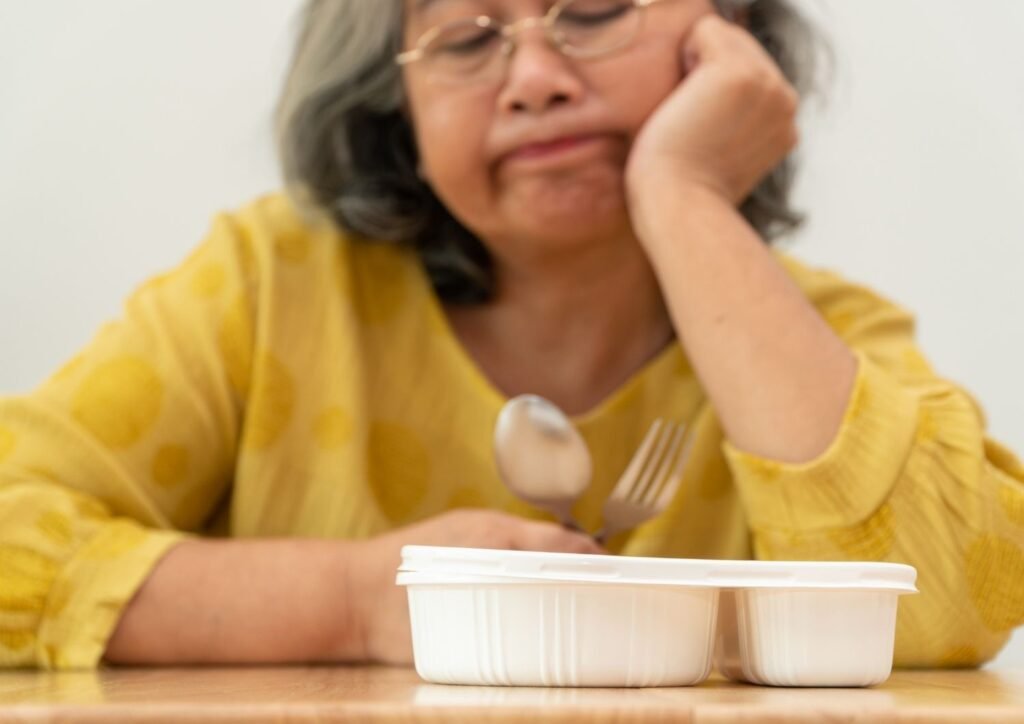 Aging reduces saliva production, impacting taste, while medications can also alter taste perception.