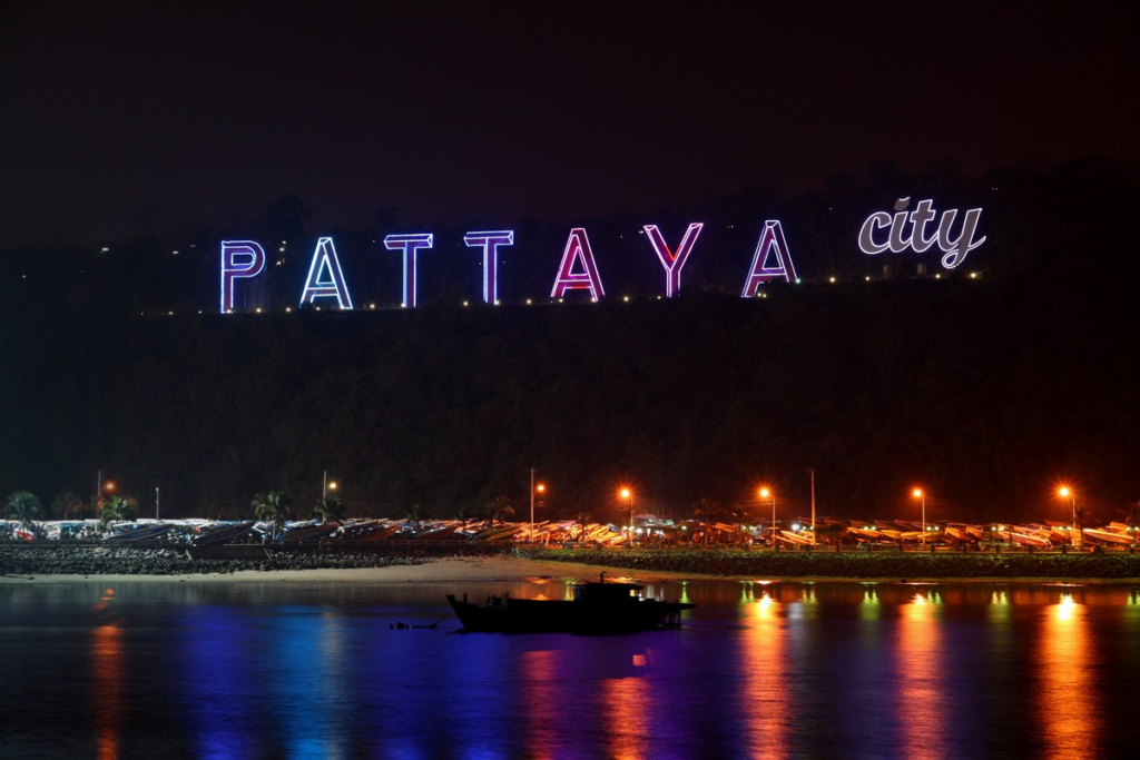 An image of Pattaya City neon sign at night.