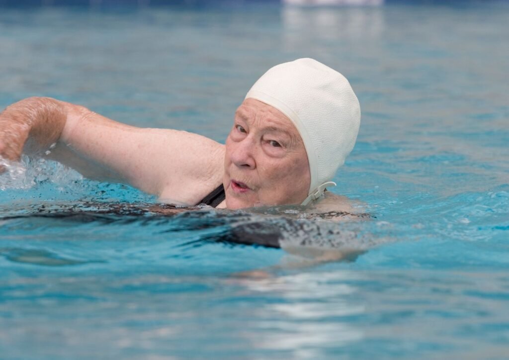 Water aerobics benefits bone density, muscle toning, and stamina by providing resistance in water.