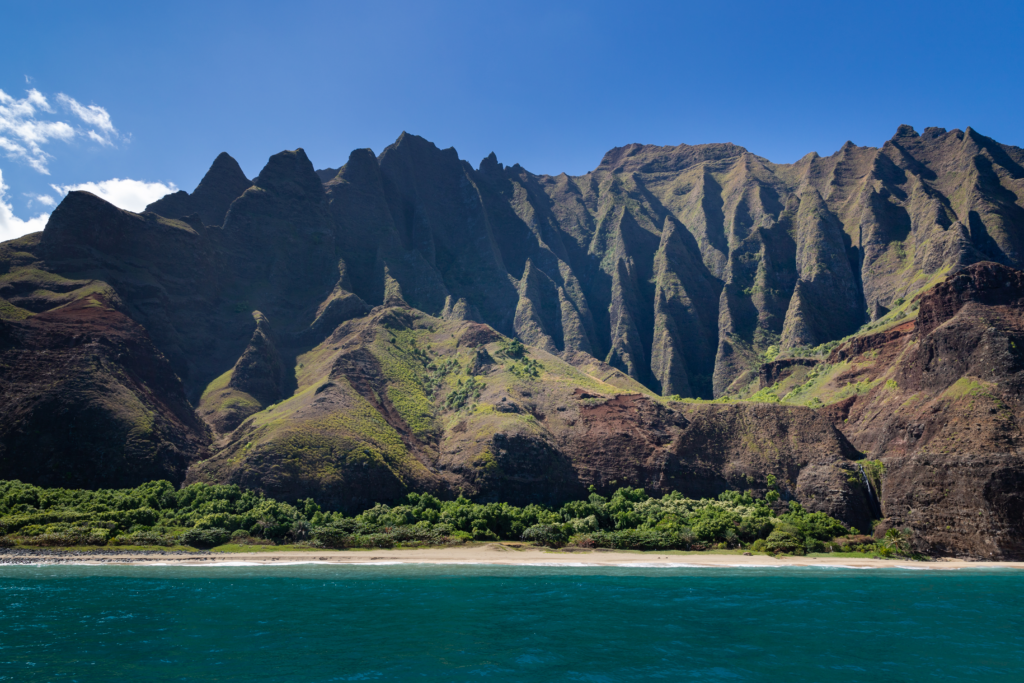 An image of the Na Pali Coast taken during a helicopter tour.
