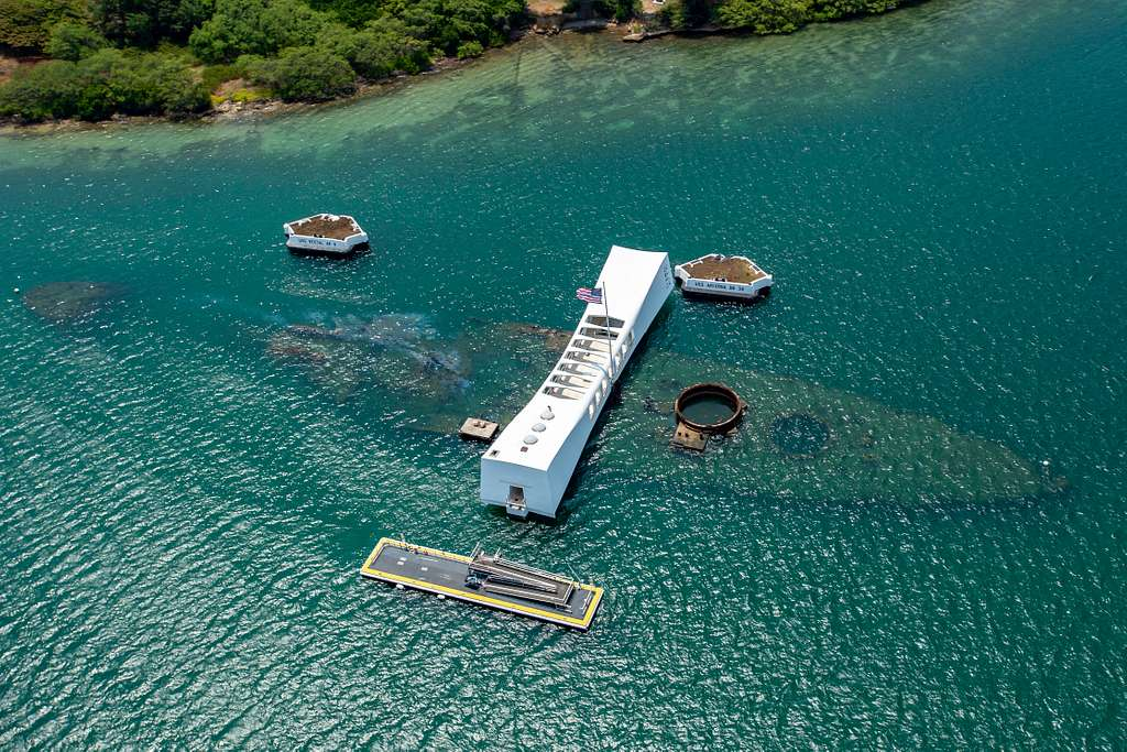 An image of the floating memorial for the USS Arizona. 