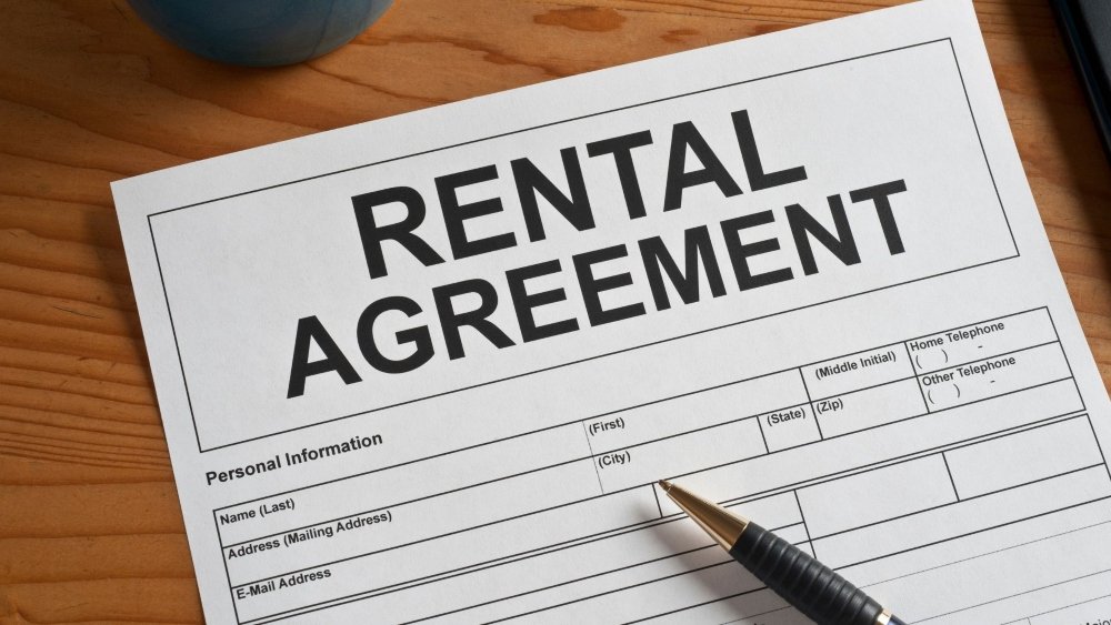 An image of a rental agreement as part of a rental property management challenge.