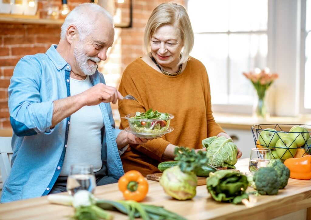 An image of a senior couple enjoying cooking. 