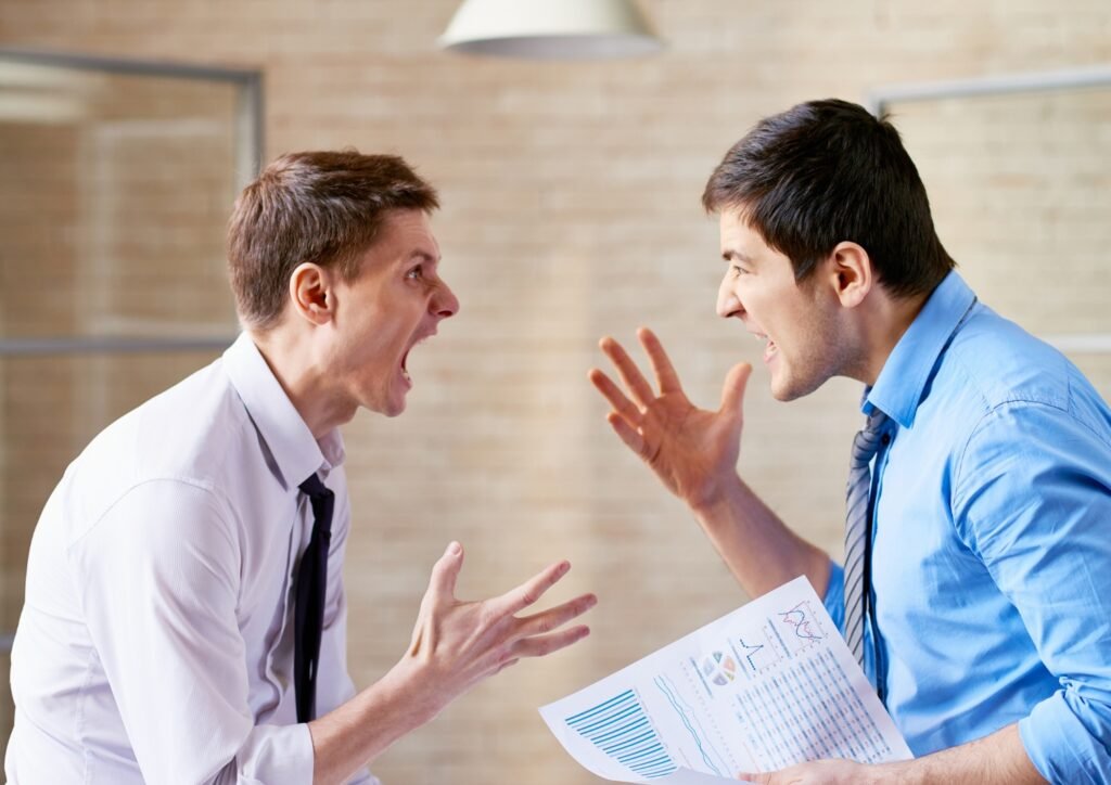 Brothers in heated argument over documents in showing conflict and tension