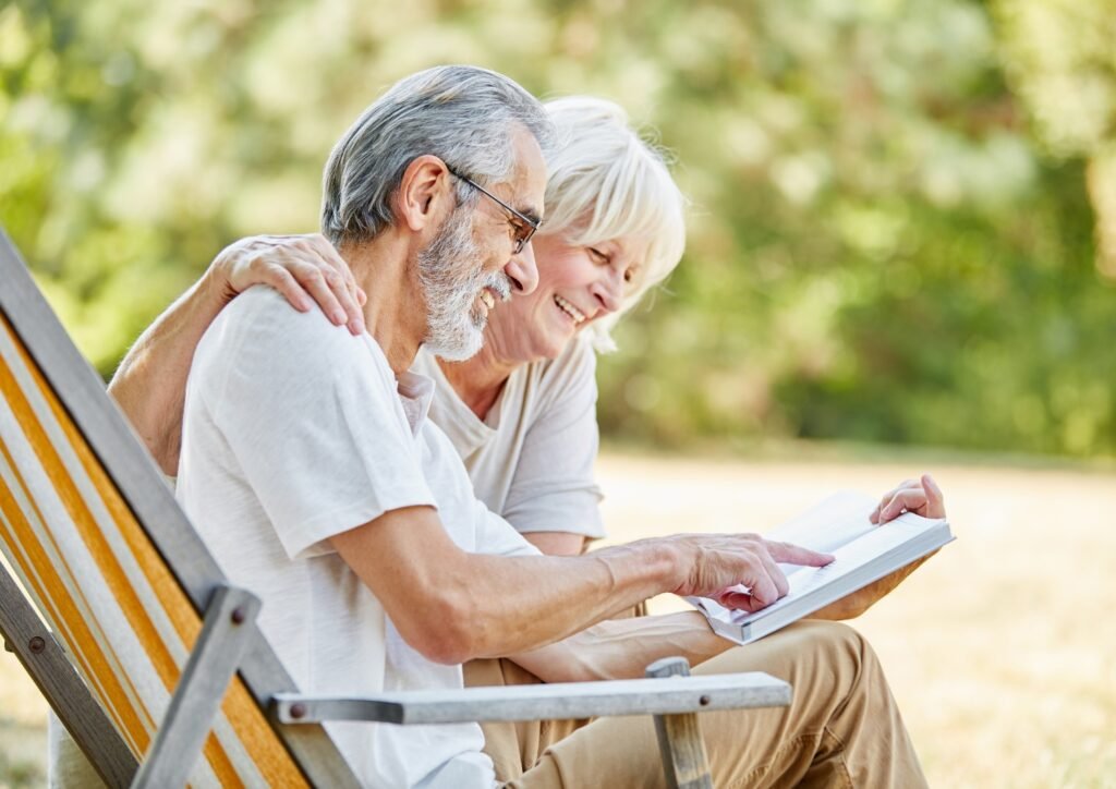 senior couple reading a book