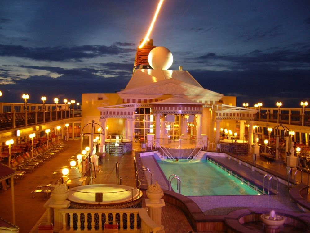 An image of the top of a cruise boat at night. 