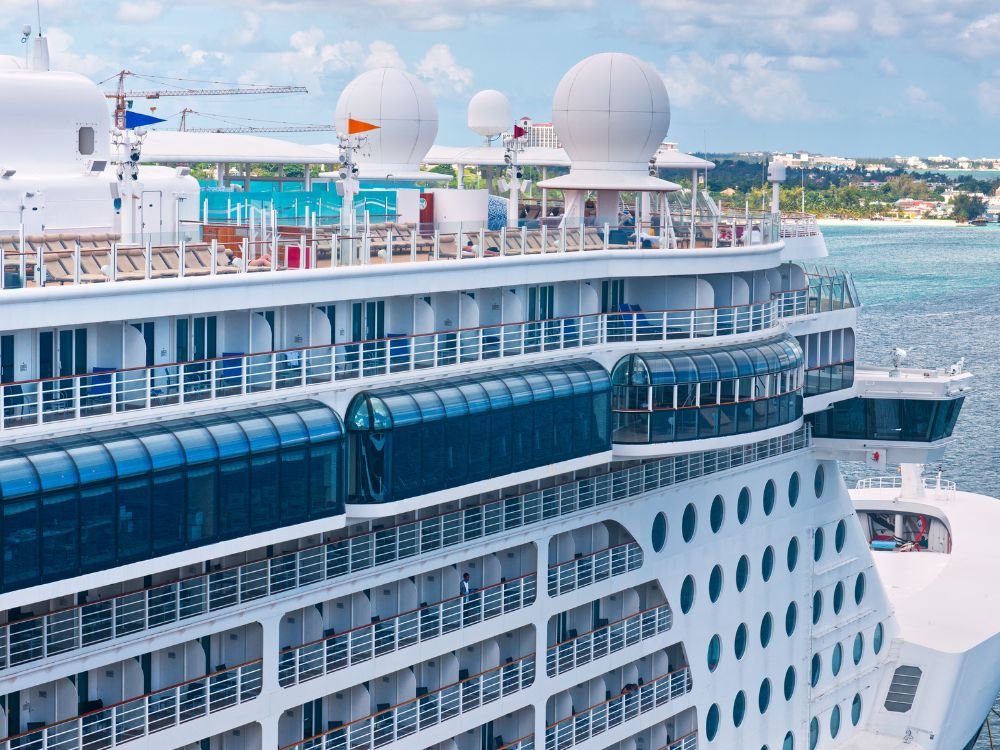 An image of a cruise ship with a view of its side. 